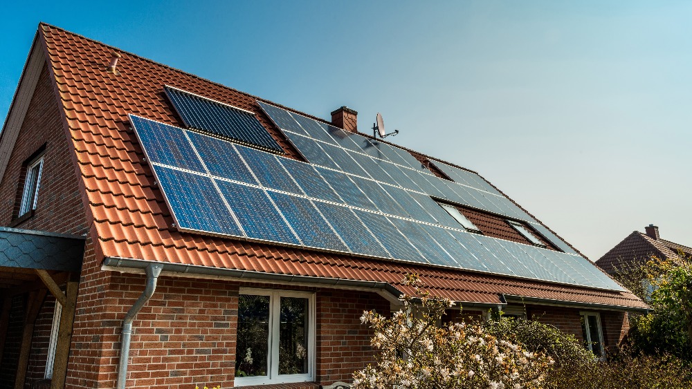 Solar panel on a red roof